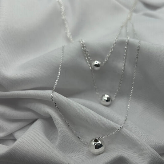 Triple Bolas (Collar triple)